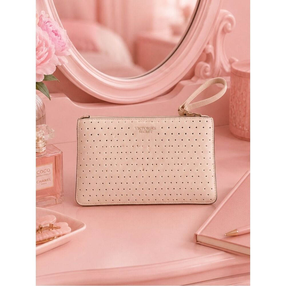 Victoria's Secret Cream pinkish cut out Perforated zip Wristlet medium